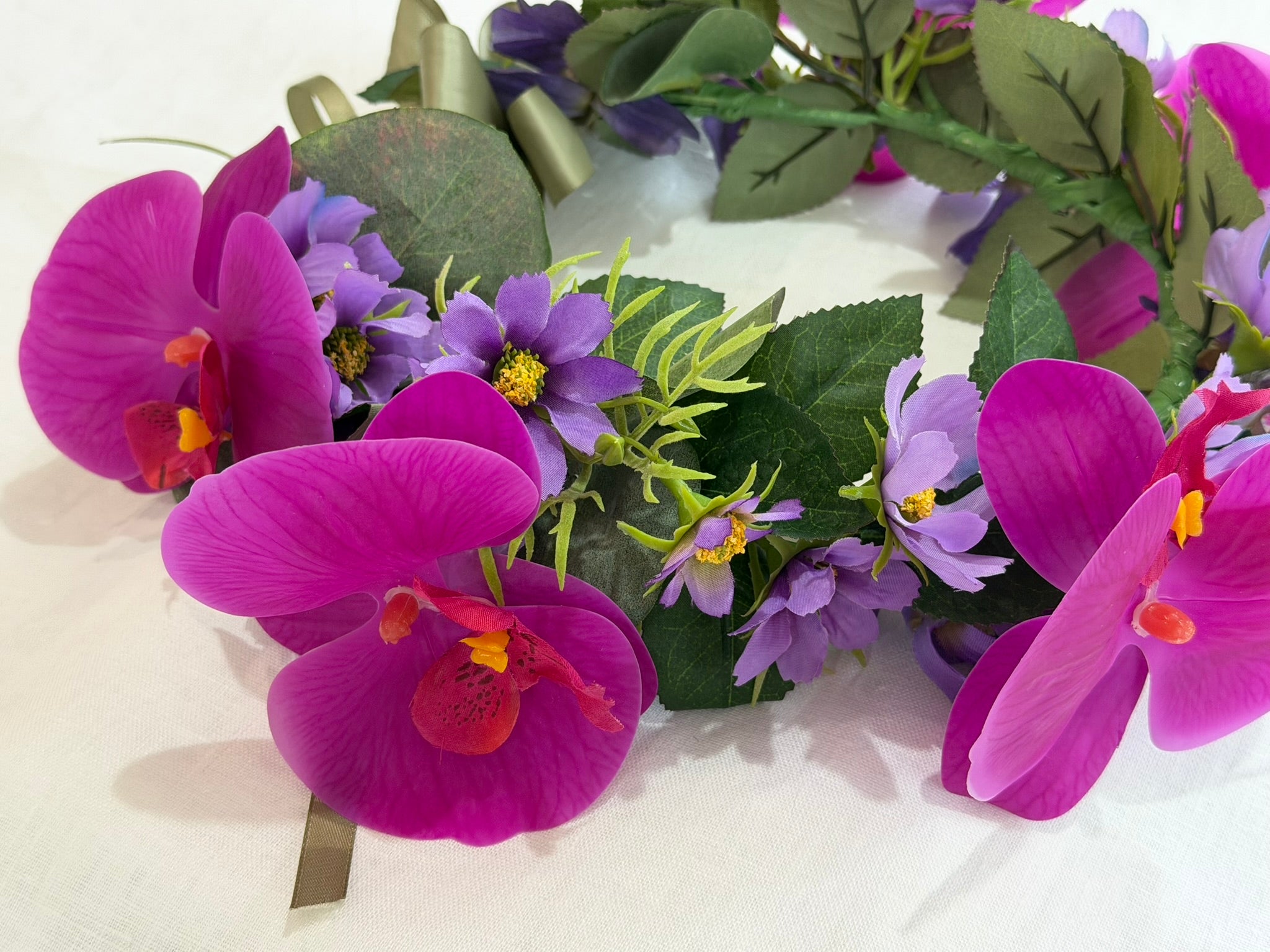 Striking purple cosmos & cerise orchids flower crown with sage satin ribbon. Perfect for weddings, hens parties & festivals. Shop The Velvet Grove - perfect for pets & humans
