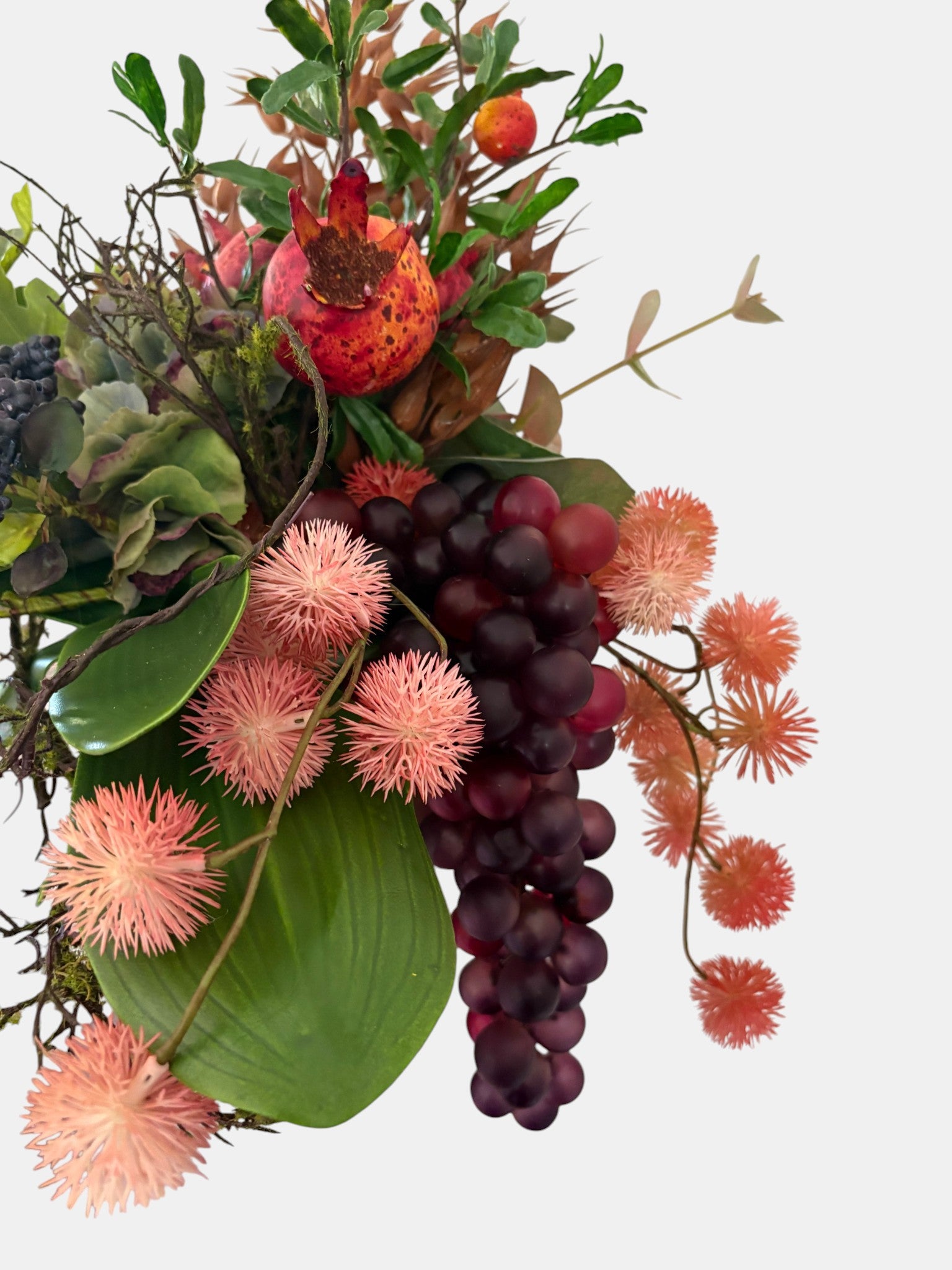Pomegranate, Winter Berries and Dark Grape Arrangement