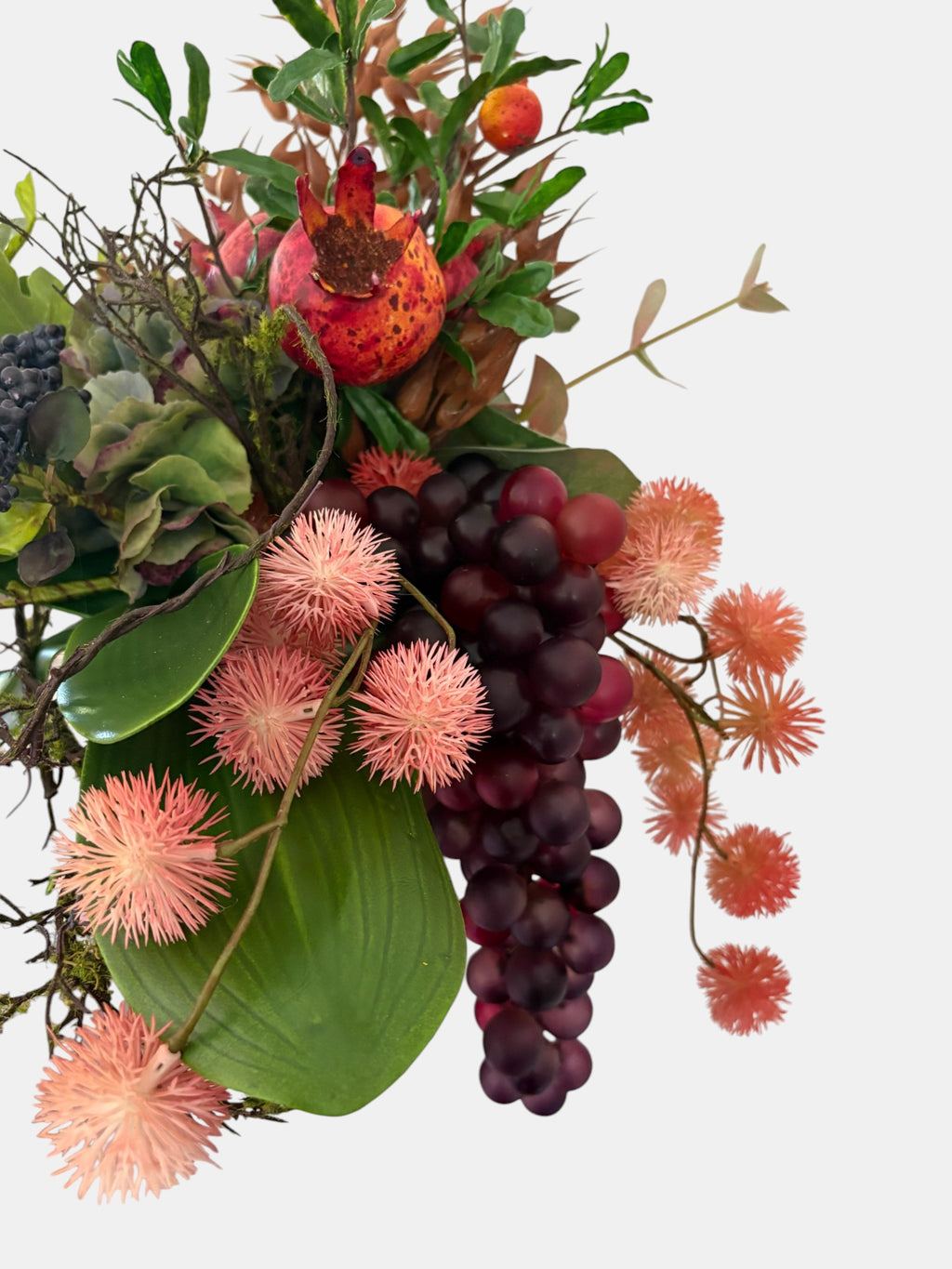 Pomegranate, Winter Berries and Dark Grape Arrangement