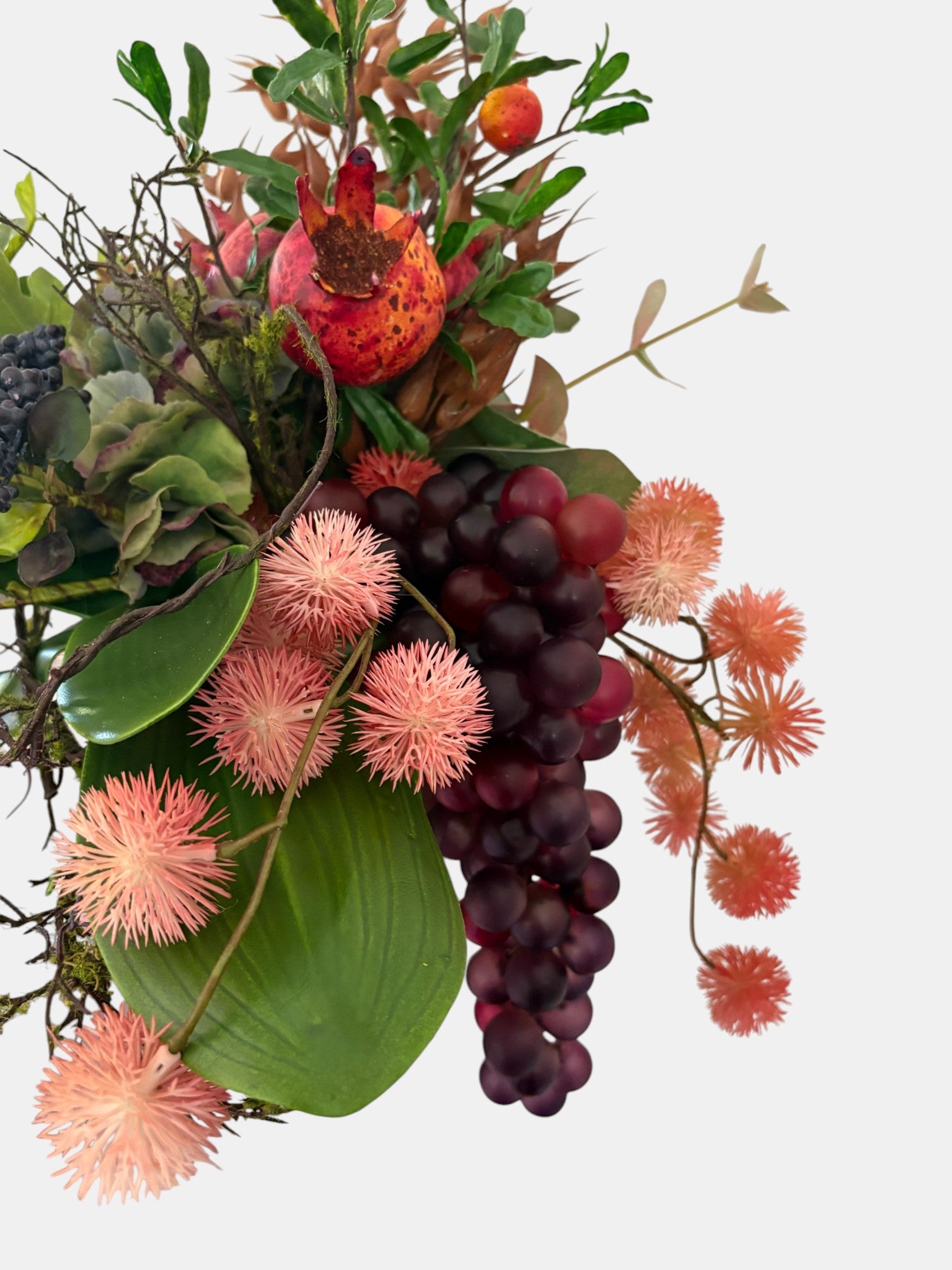 Pomegranate, Winter Berries and Dark Grape Arrangement