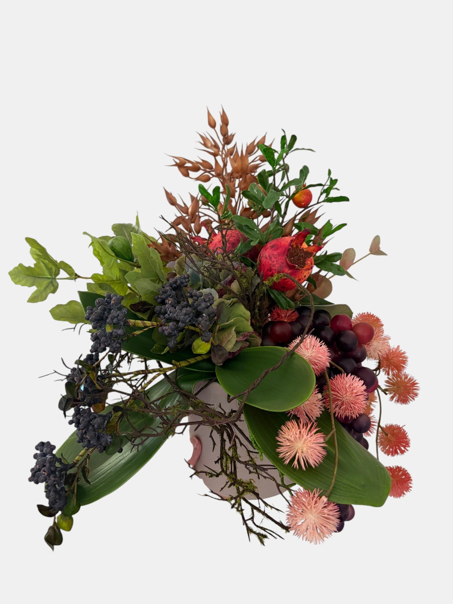 Pomegranate, Winter Berries and Dark Grape Arrangement