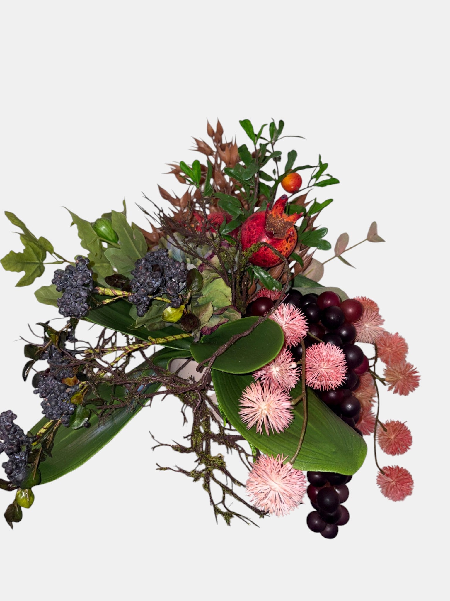 Pomegranate, Winter Berries and Dark Grape Arrangement