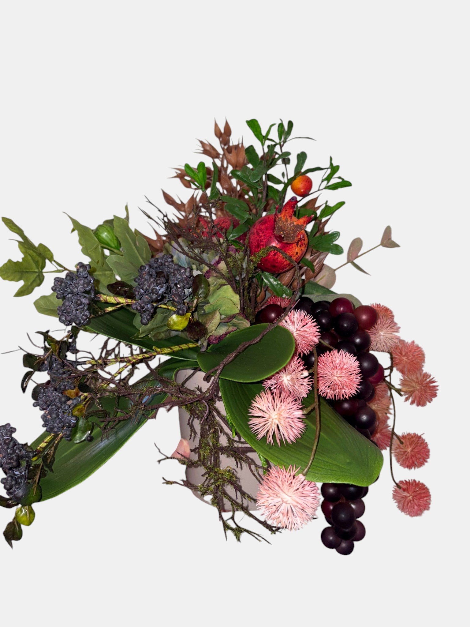 Pomegranate, Winter Berries and Dark Grape Arrangement