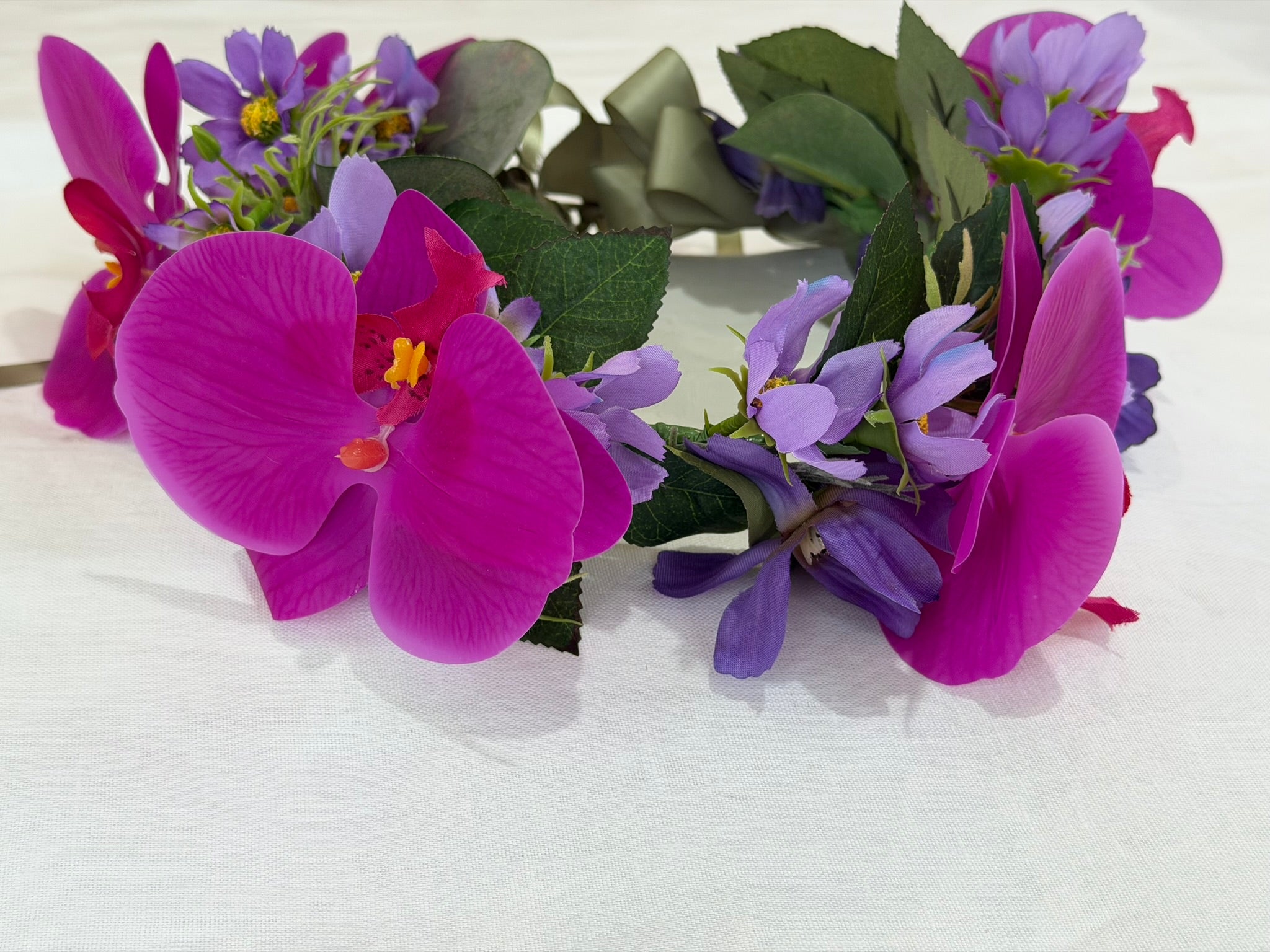 Striking purple cosmos & cerise orchids flower crown with sage satin ribbon. Perfect for weddings, hens parties & festivals. Shop The Velvet Grove - perfect for pets & humans