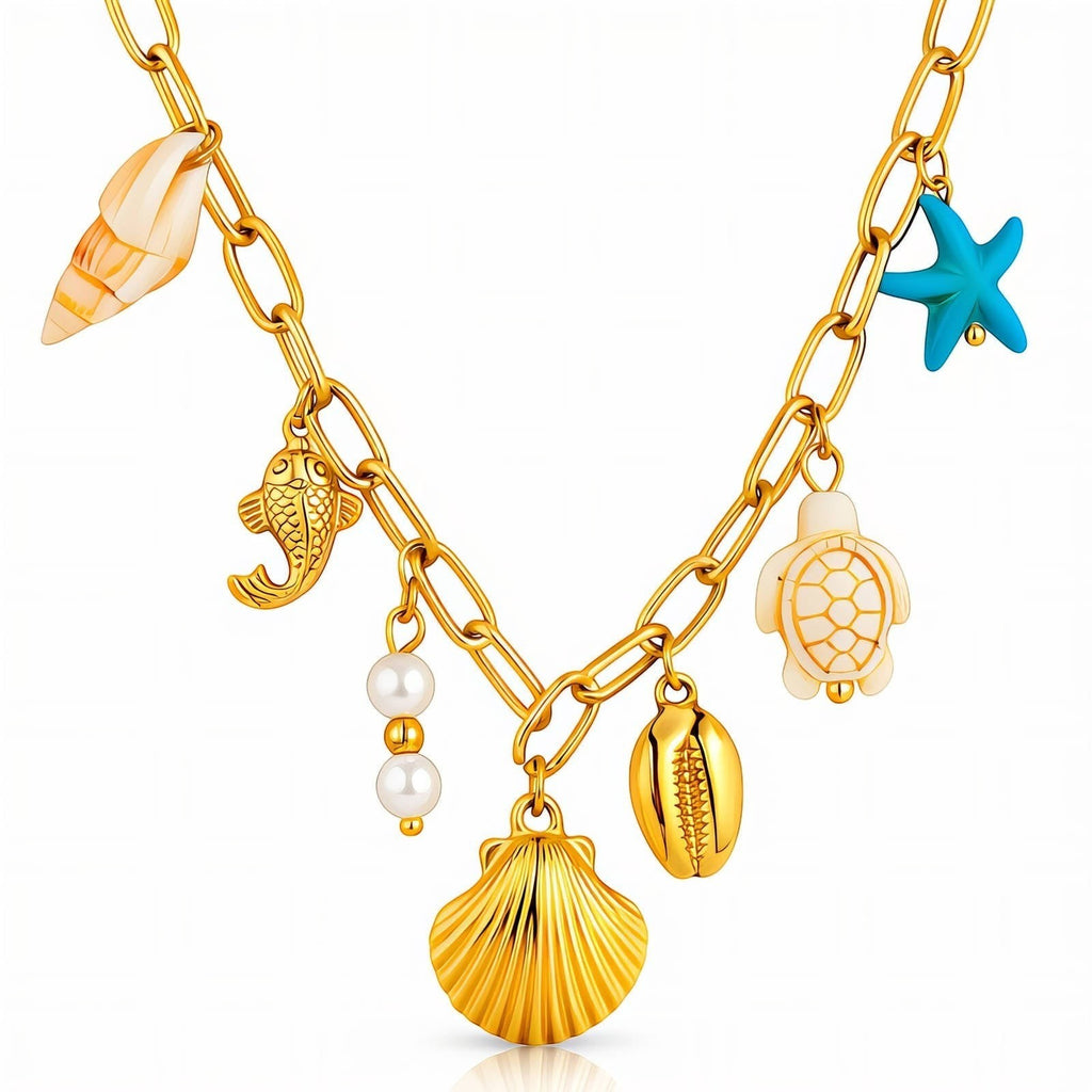 The Velvet Grove gold-tone link necklace featuring seashell, starfish, turtle, and pearl charms for a coastal style.