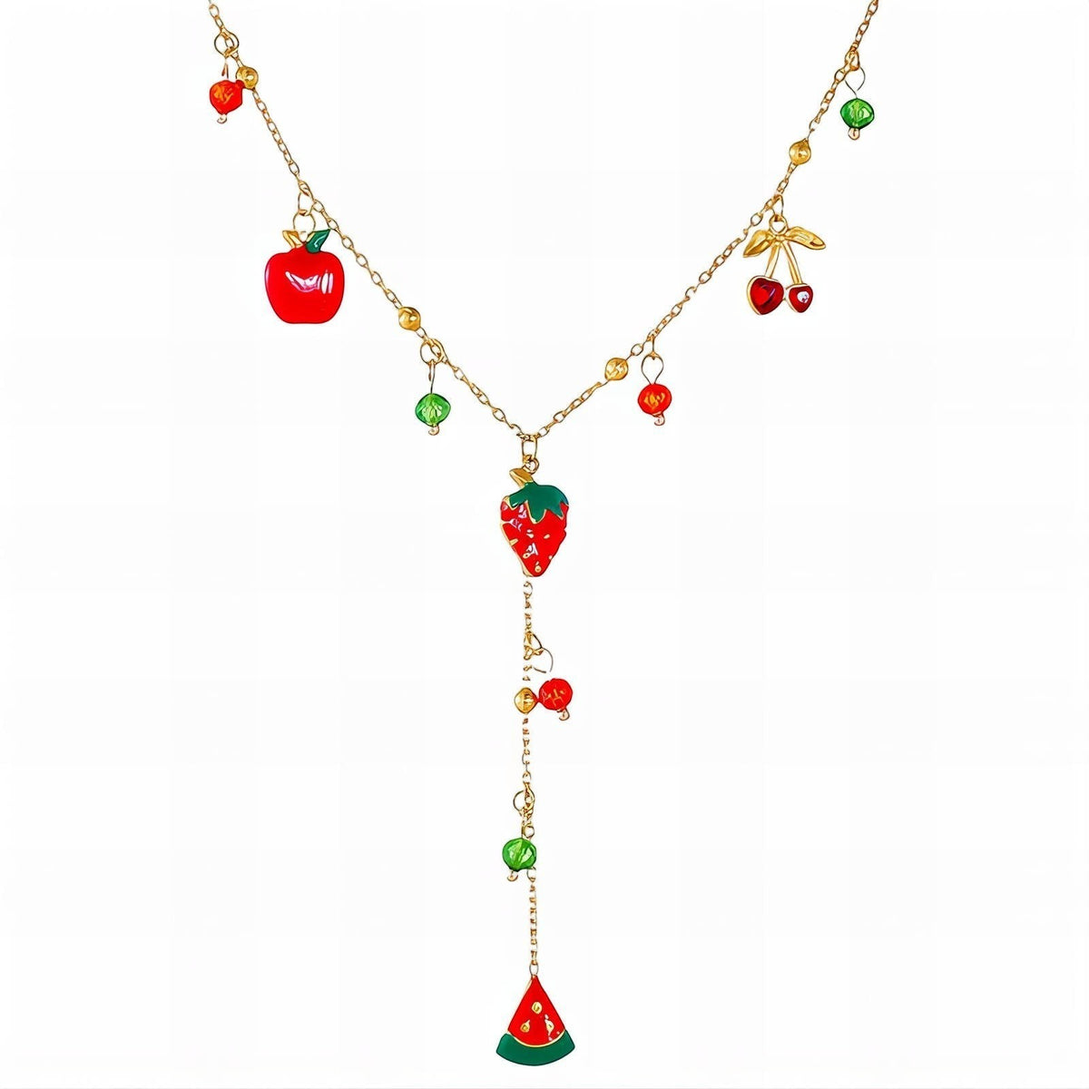 The Velvet Grove gold-tone layered necklace featuring vibrant enamel fruit charms like strawberries, cherries, and apples.