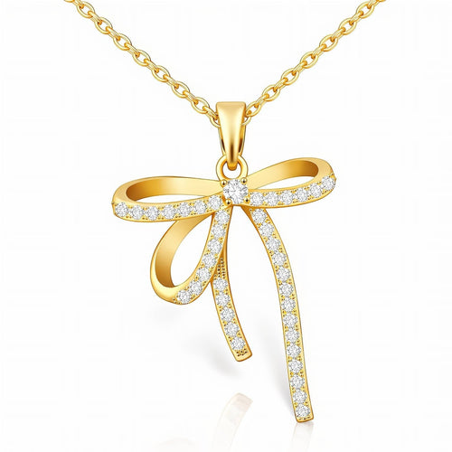 The Velvet Grove gold-tone bow pendant necklace featuring shimmering cubic zirconia stones on a delicate chain.