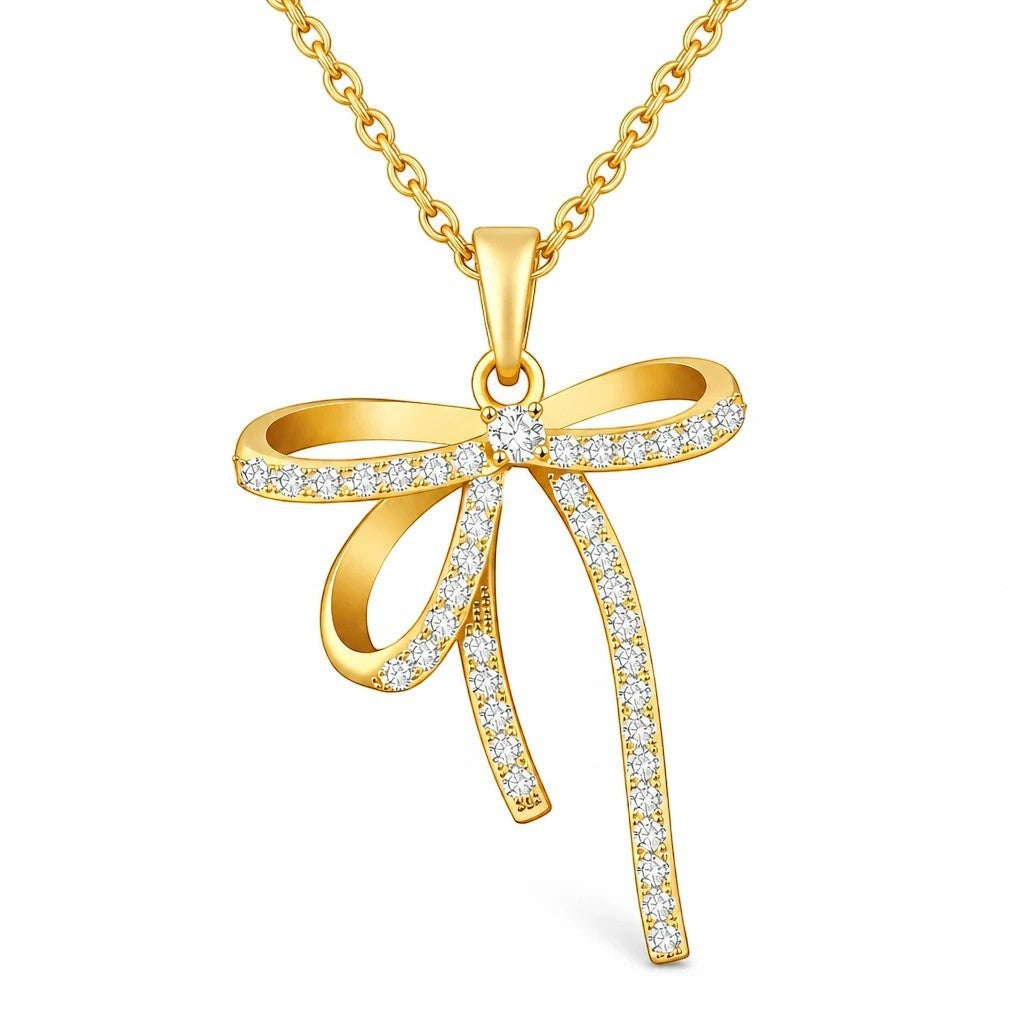 The Velvet Grove 18K gold plated stainless steel necklace featuring a bow pendant with sparkling cubic zirconia.
