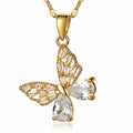 The Velvet Grove gold-toned butterfly pendant necklace featuring sparkling clear crystals on a delicate chain.