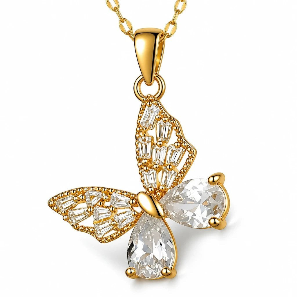 The Velvet Grove gold-toned butterfly pendant necklace featuring sparkling baguette and teardrop crystals.