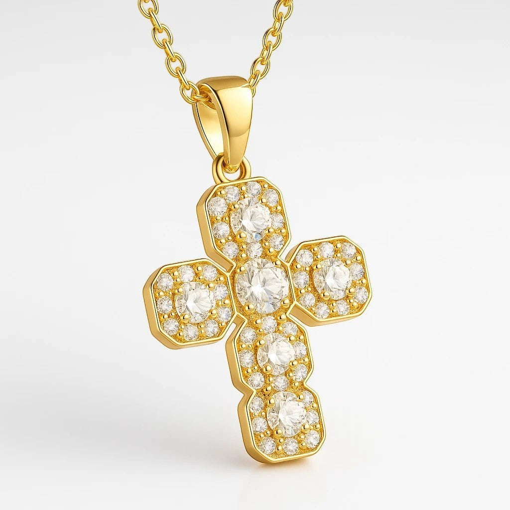The Velvet Grove gold-tone cross pendant necklace featuring pavé-set cubic zirconia stones on a delicate chain.
