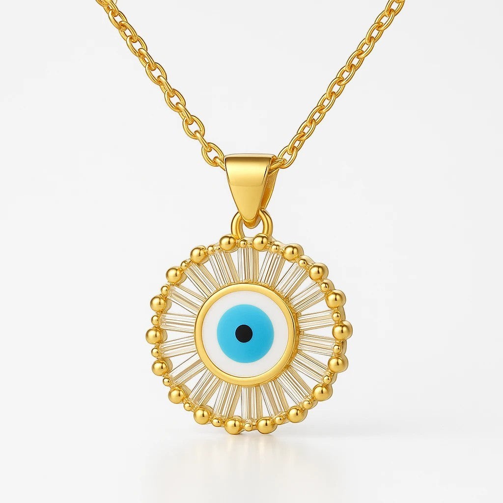 The Velvet Grove gold-tone evil eye pendant necklace featuring a radiant halo of baguette-cut crystals on a delicate chain