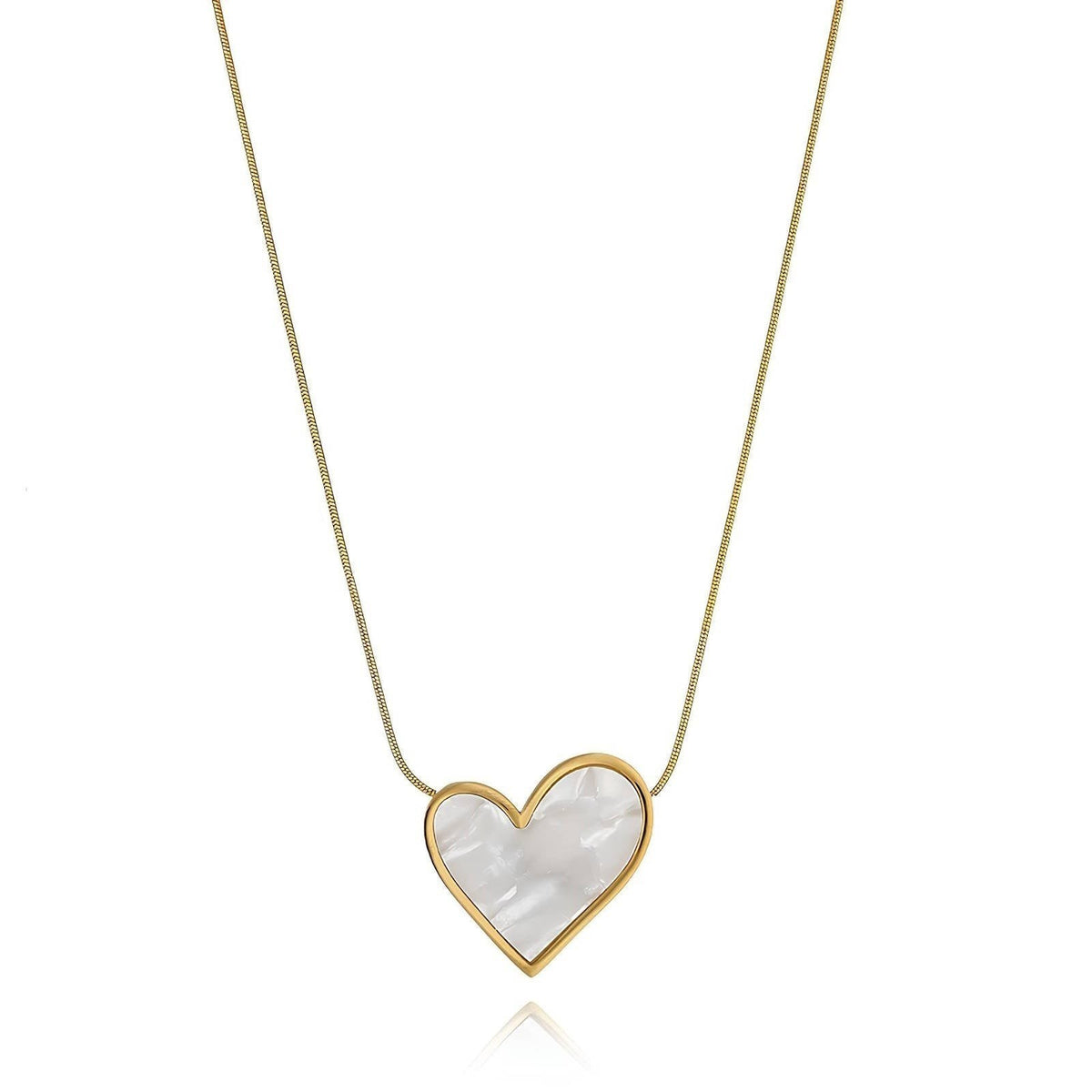 The Velvet Grove heart pendant necklace featuring a pearlescent inlay in a polished gold-tone frame on a delicate chain.