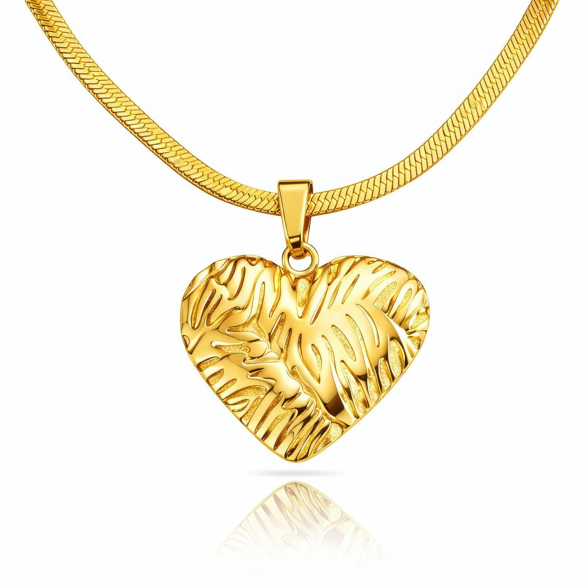 The Velvet Grove 18k gold plated textured heart pendant necklace on a sleek herringbone chain.