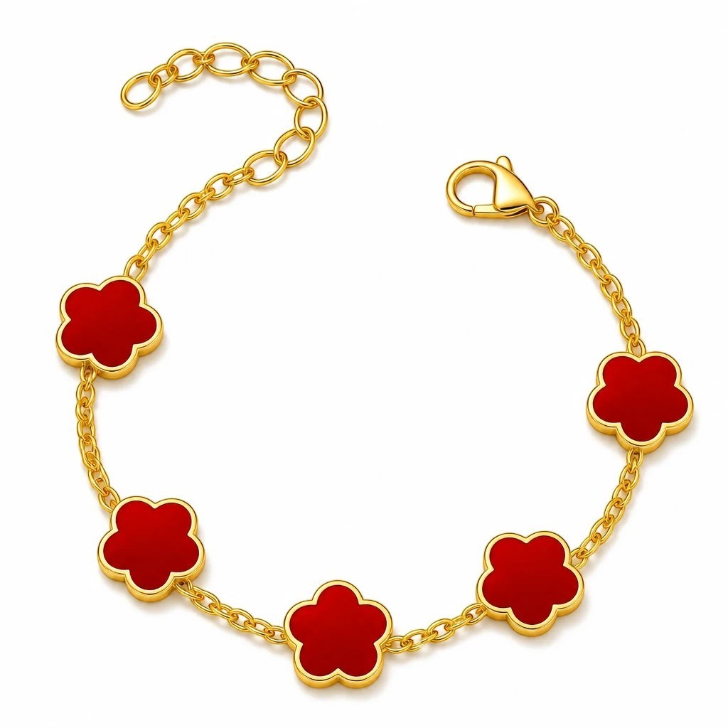 The Velvet Grove gold-tone link chain bracelet featuring vibrant red floral charms with an adjustable lobster clasp.